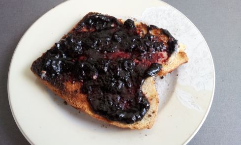 German bread with butter and blueberry jam